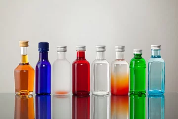 Wandcirkels plexiglas Group of colorful bottles © Carlos Yudica