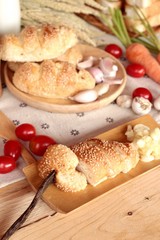 Garlic bread of herb delicious on wood background.