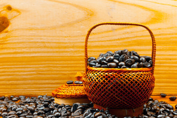 .Coffee beans roasted in bamboo baskets..