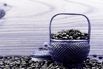 .Coffee beans roasted in bamboo baskets..