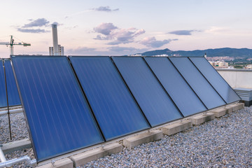 Solar panels / In the picture we can see a solar panels located on the roof of a building