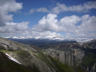 French lower alpine valley with view to the alps