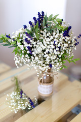 Fragrant bouquet of baby's breath with eucalyptus and lavender in a glass bowl