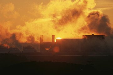 Fototapeta premium Sunrise at industrial plant