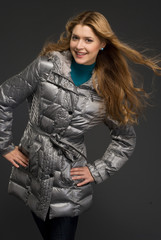 Young beautiful woman in winter clothes