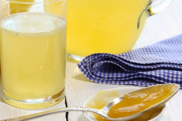 Beverage of honey and lemon in a glass