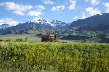 Old covered wagon in the Absaroka Mountains of Wyoming