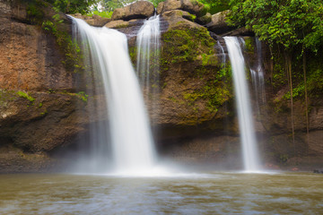 Fototapeta premium Tropical Waterfall in deep national park of Thailand