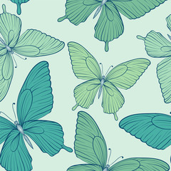 Beautiful seamless background with blue butterflies.