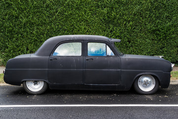 Modified Black Retro Car on Road