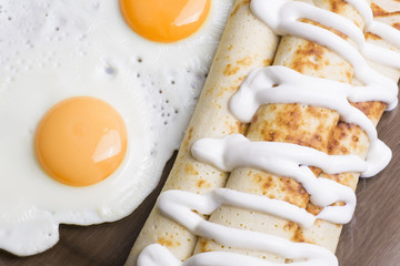 pancakes with eggs and sour cream