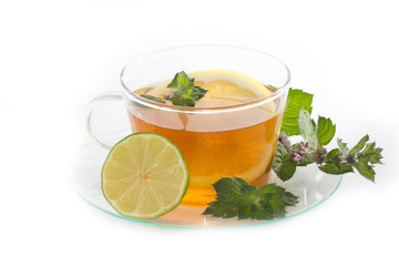 Cup of tea with lemon and mint isolated