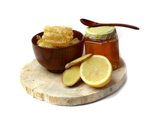 Honey in the comb , honey jar