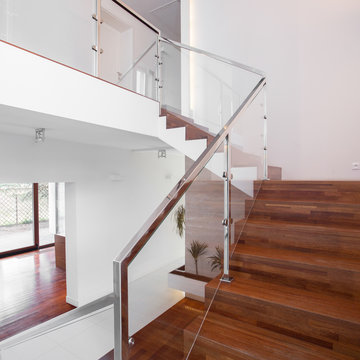Wooden stairs with elegant balustrade