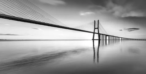 Fototapeten An black and white vision of the bridge Vasco da Gama © Henrique Silva