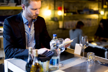 Young man in the restaurant