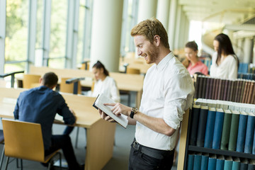 Young man in the library