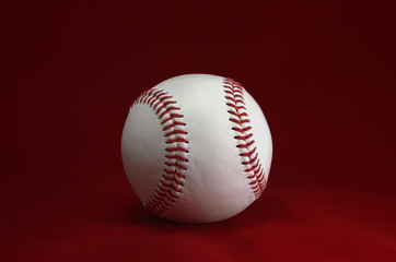 Baseball on a red background