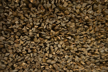 Firewood - pieces of teak wood, background