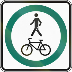 Regulatory road sign in Quebec, Canada - Shared use path with single lane