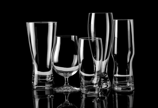 Group of empty glasses different sizes