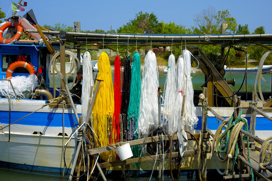 colorful, floating nets of a fishing boat of Lake Varano, Puglia. Italy