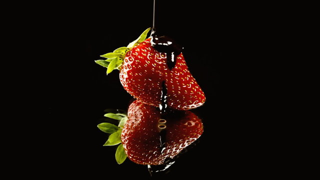 Strawberry chocolate covered on mirror