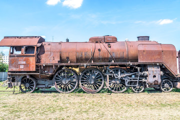 Fototapeta na wymiar Old Czechoslovakian CSD steam engine on graveyard, rusty