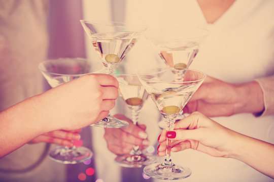 Woman hands with glasses of champagne - Powered by Adobe