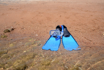 Skin diving gear lying ready on the beach