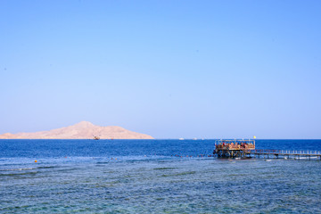 Tropical bay with a wooden jetty or pier