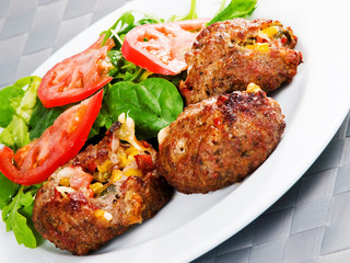 Meatballs with corn and cheese