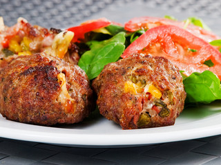 Meatballs with corn and cheese