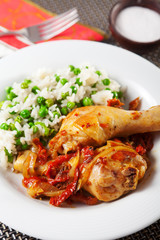 Chicken with rice and tomato sauce