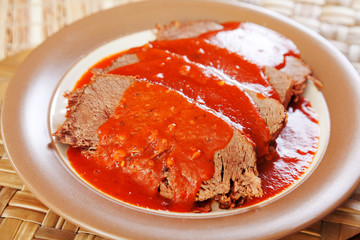 Veal with tomato sauce