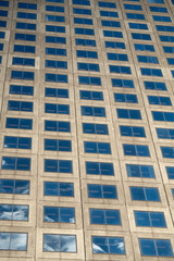 Reflection of clouds in building windows