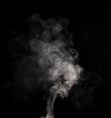 White smoke on black background