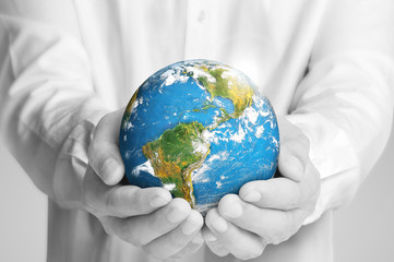  global in hands.Ecology concept. Elements of this image are fur