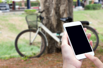 Woman hand with smartphone