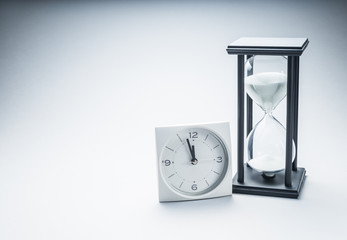 Table clock and Hourglass.