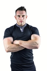 Tough rugby player looking at camera