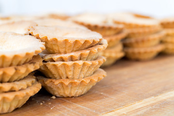 Empty Tartlets on Wooden Table