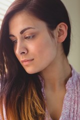 Naklejka premium Pretty brunette looking down