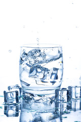 water splash in glass of blue color