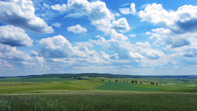 summer landscape with cloudy sky, view from hill, timelapse
