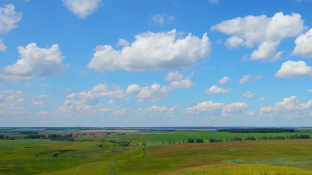 summer landscape with cloudy sky, view from hill, timelapse
