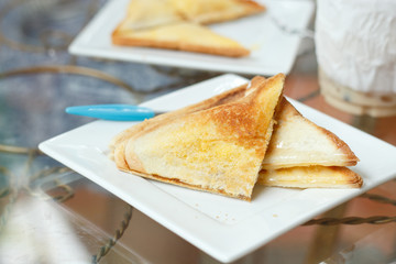 Toasts and coffee for breakfast.