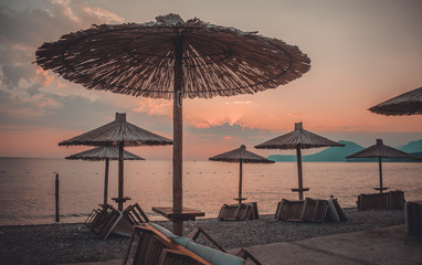 Umbrellas on the beach. Retro style filter
