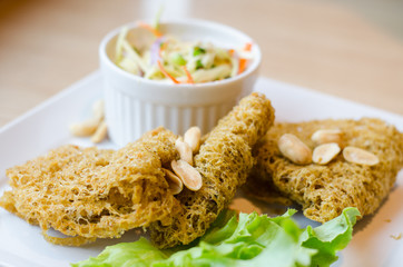 Spicy Crispy Catfish in white plate