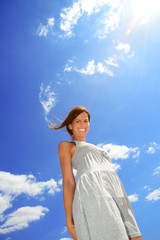 woman against cloudy sky
